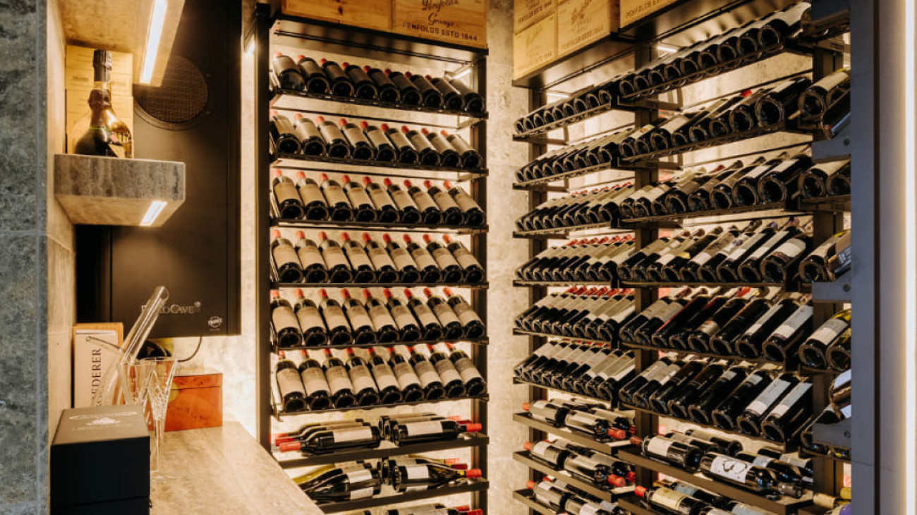 Photo of a beautiful cellar design that showcases a wine lover's collection of vintages