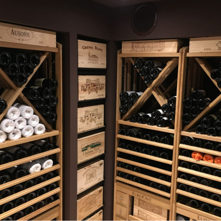 Wine cellar with modular wooden wine storage racks EuroCave Modulothèque.