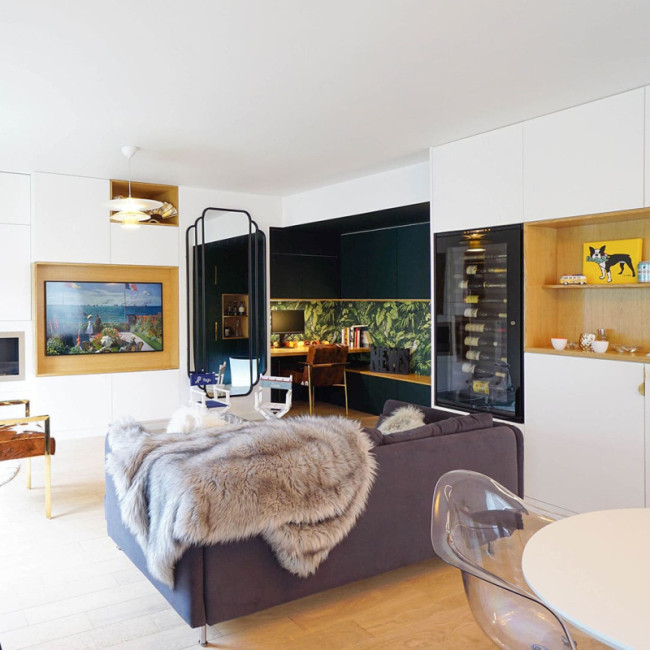 EuroCave wine fridge integrated into custom furniture in the context of a Paris apartment renovation by Bardin Architecte
