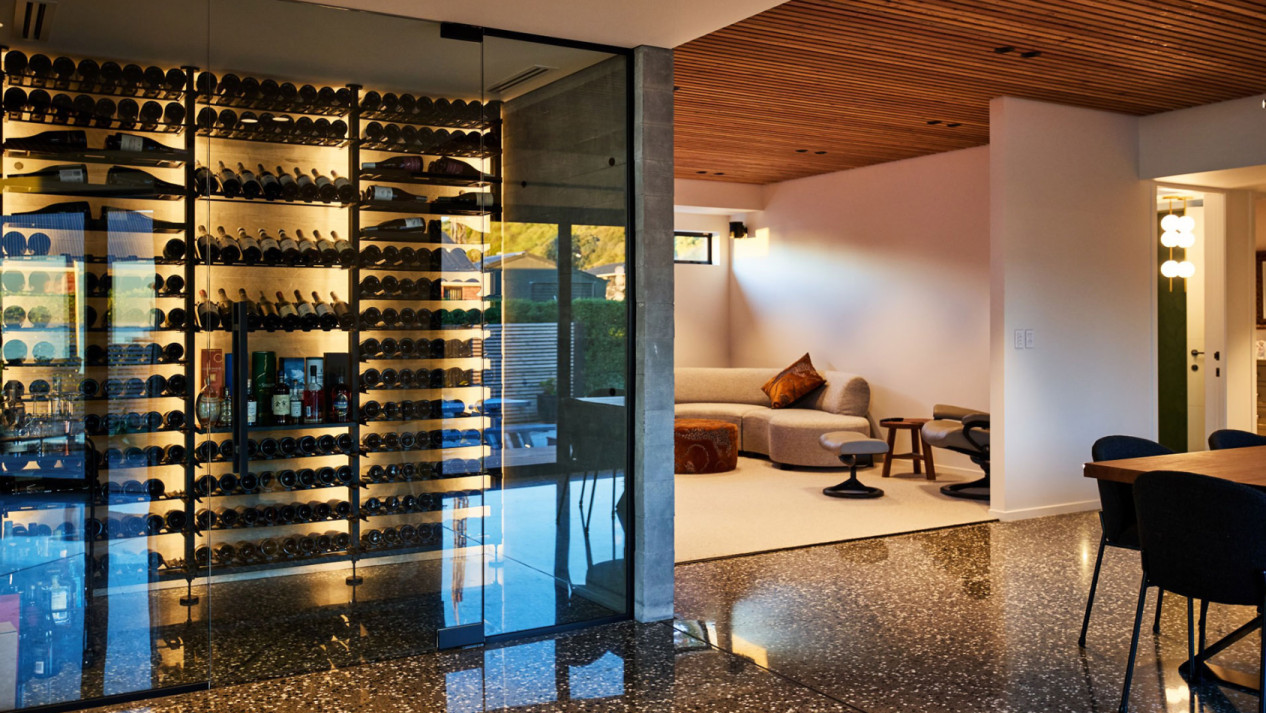 Climate-controlled wine display in the living room. Create a tasting area and add character to your home’s interior design. Discover our finest installations.