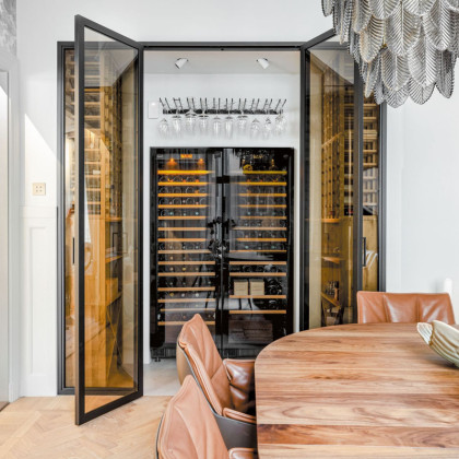Double built-in wine fridge inside a bespoke glass wine room by EuroCave Compact, Sweden.