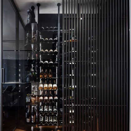 Interior design project showcasing a modern Modulo-X aluminum wine storage system.