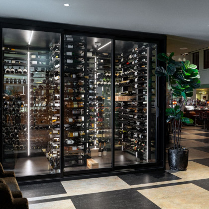 Custom-made professional wine display by EuroCave for high-end hospitality interiors.